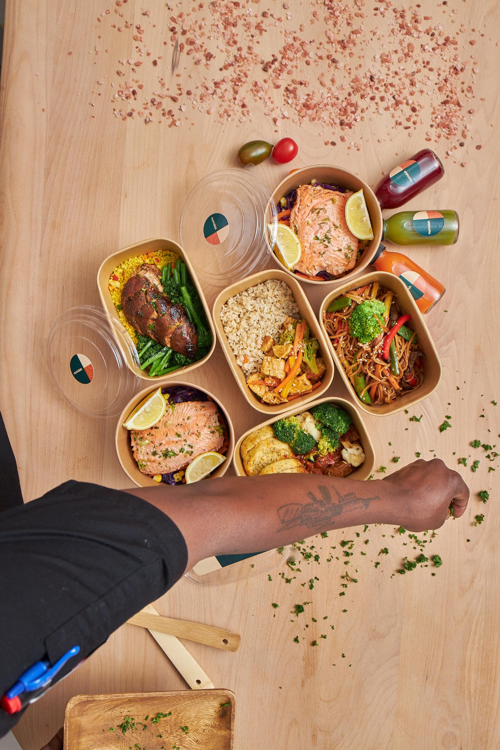 Nutridish chef with fresh meals and juices ready for delivery across Johannesburg
